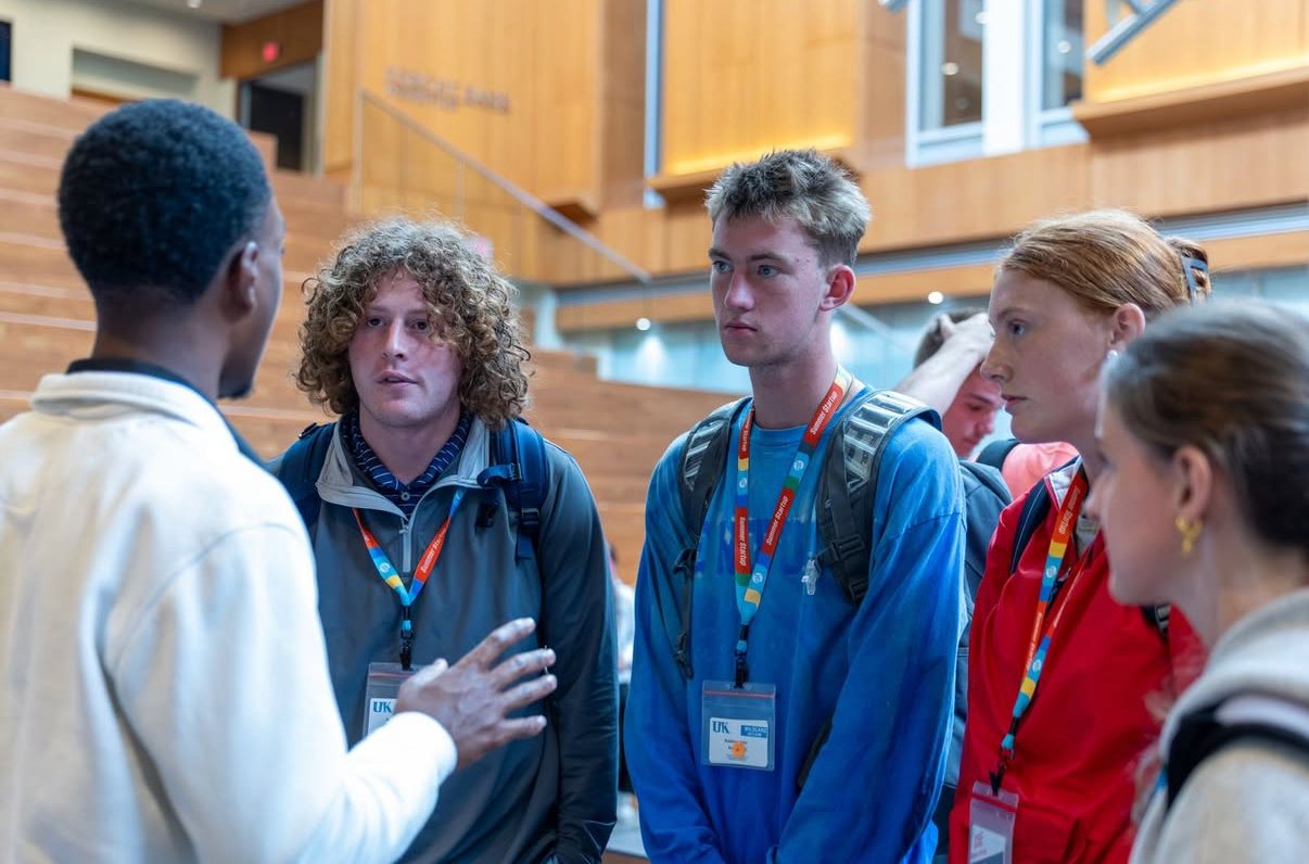 Arnold Moto speaking with GSE Collegiate Pitch attendees